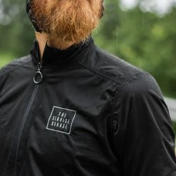 The Service Course Packable Jacket - Black -Cycling Accessories Shop image c314400b 13f4 437b ab17 479a47d0c91d