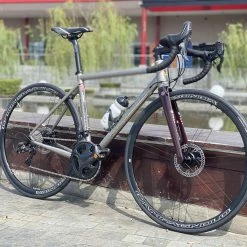 Tommasini Mach Titanium Road Disc Bike With Campagnolo Super Record - Burgundy -Cycling Accessories Shop image cb350db3 b7bf 44a8 a439 2efe2a2d399b scaled