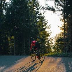 PEdALED Tokaido Alpha Jacket - Coral Red -Cycling Accessories Shop men alpha cycling jacket coral red tokaido pedaled action back
