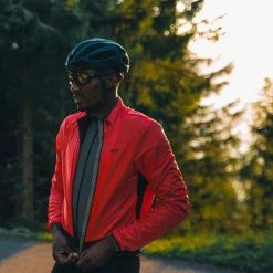 PEdALED Tokaido Alpha Jacket - Coral Red -Cycling Accessories Shop men alpha cycling jacket coral red tokaido pedaled detail front