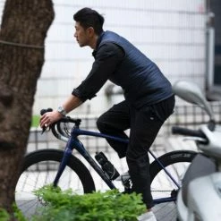 Pedaled Tsuin Reversible Vest - Black -Cycling Accessories Shop men reversible cycling vest black tsuin pedaled action side