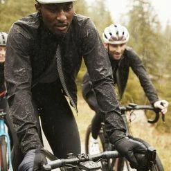 PEdALED Mirai All Weather Jacket - Black -Cycling Accessories Shop mirai waterproof cycling jacket front in action pedaeld